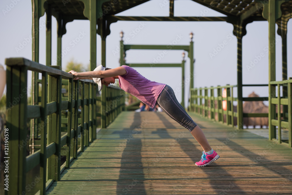 woman  stretching before morning jogging