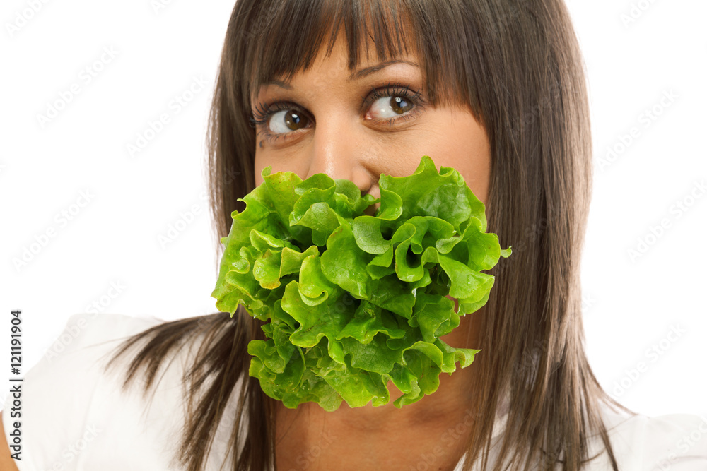Φωτογραφία Young woman eating fresh salad isolated on white background. Hor
