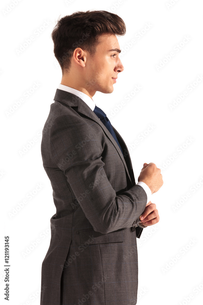 profile picture of a young business man fixing his sleeve profile picture of a young business man fixing his sleeve