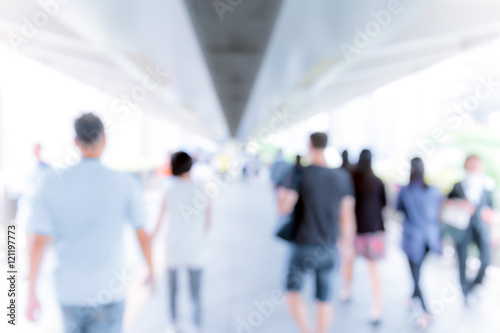 Abstract background of people on footbridge 