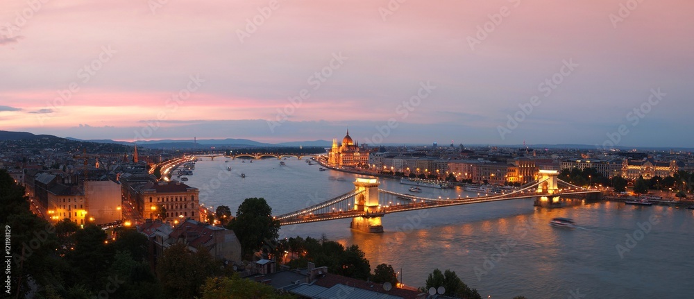 Budapest by night with Szechenyi Chain Bridge and Hungarian parliament building