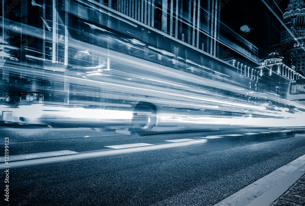 Fototapeta premium blurred traffic light trails on road at night in China.