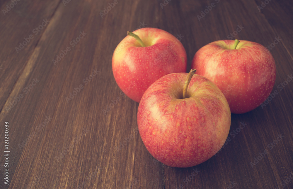 Apples on wooden rustic background Apples on wooden rustic background