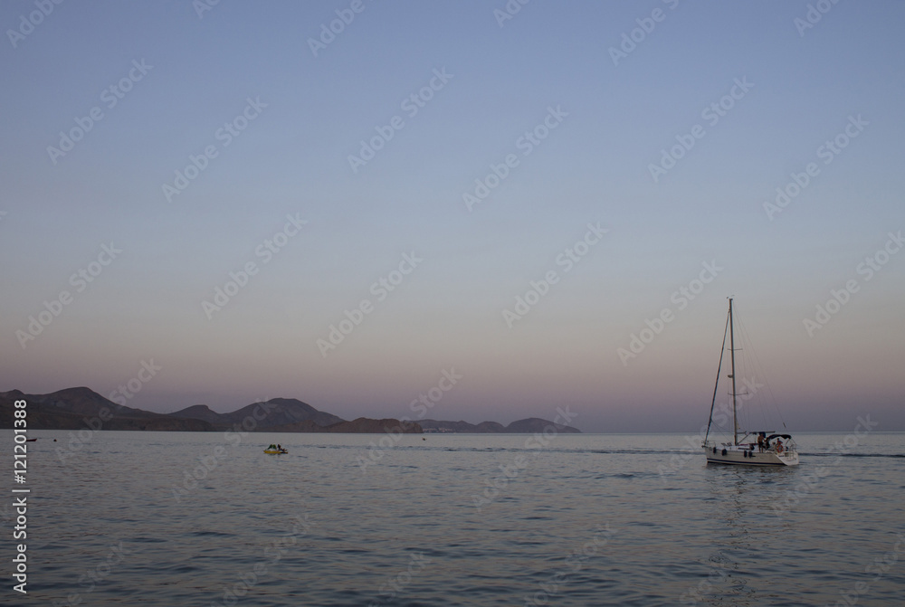 Sailboat at sunset in the Black Sea. Crimea, summer 2015