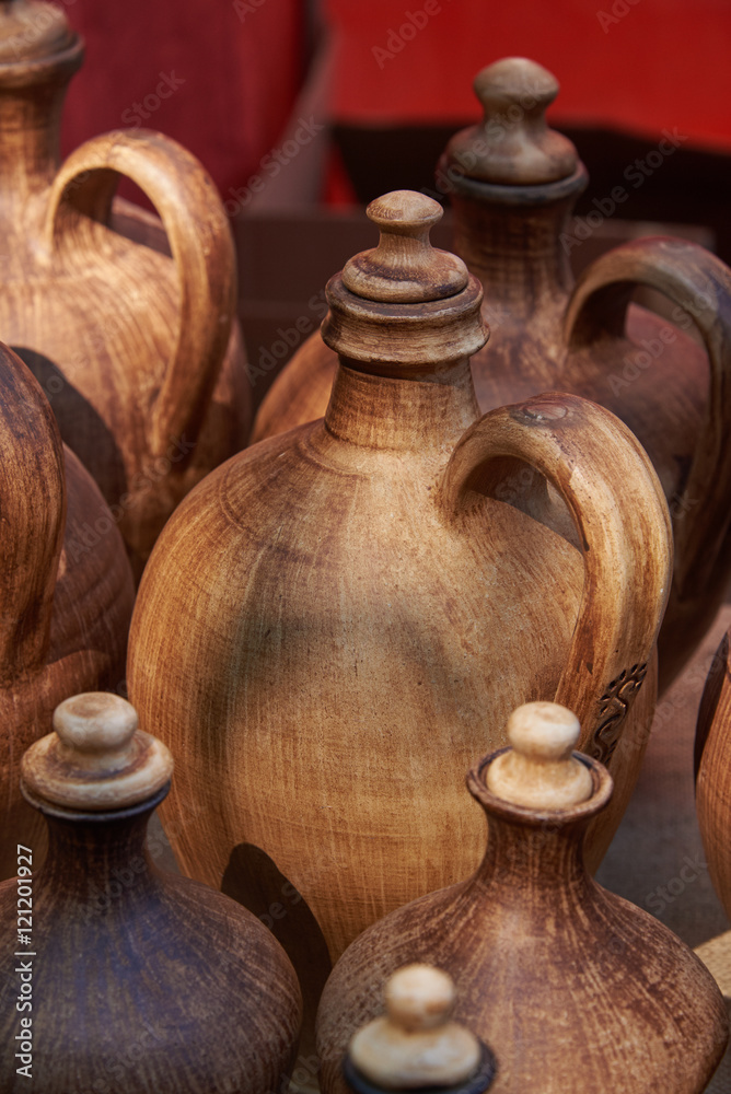 Ceramic bottle. Image focus on the bottle in the center Ceramic bottle. Image focus on the bottle in the center