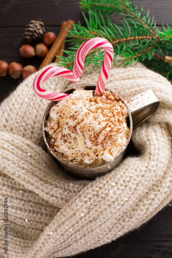 Christmas Homemade Peppermint Hot Chocolate with Whipped Cream and Candy Cane, top view Christmas Homemade Peppermint Hot Chocolate with Whipped Cream and Candy Cane, top view