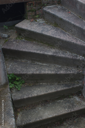 Old stone dark stair. Spiral staircase