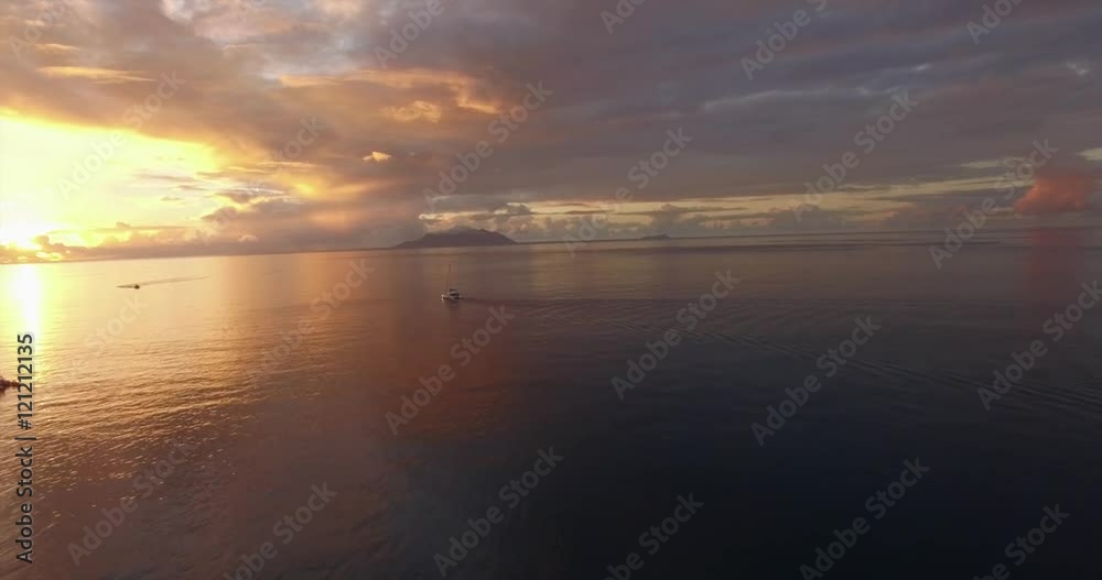 Sailing boats on a background of a beautiful sunset Sailing boats on a background of a beautiful sunset