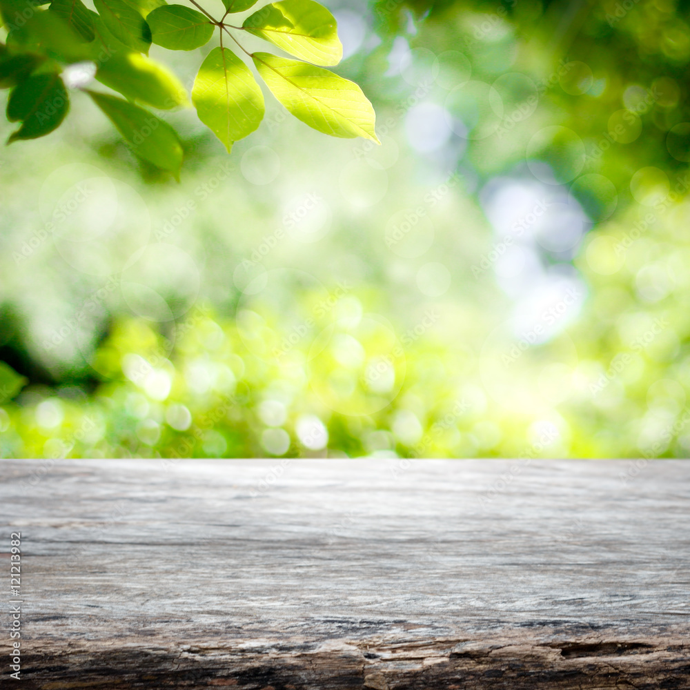 Empty wooden table with garden bokeh background with a country outdoor theme,Template mock up for display of product Empty wooden table with garden bokeh background with a country outdoor theme,Template mock up for display of product