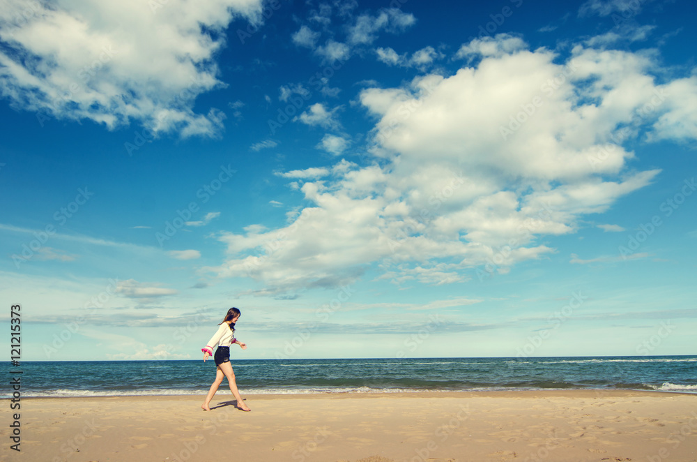 Young asian woman relax on the beach, outdoor.