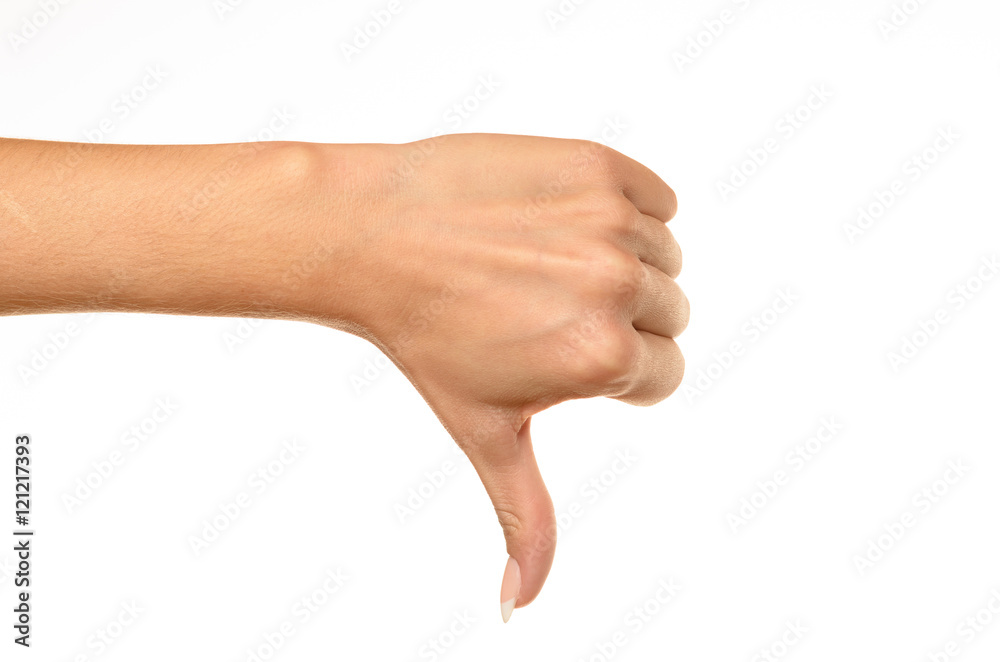female hand showing thumbs down sign female hand showing thumbs down sign
