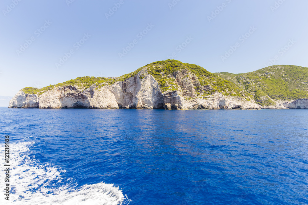 Cruise around Zakynthos, views from the sea on the island, Greece, background.