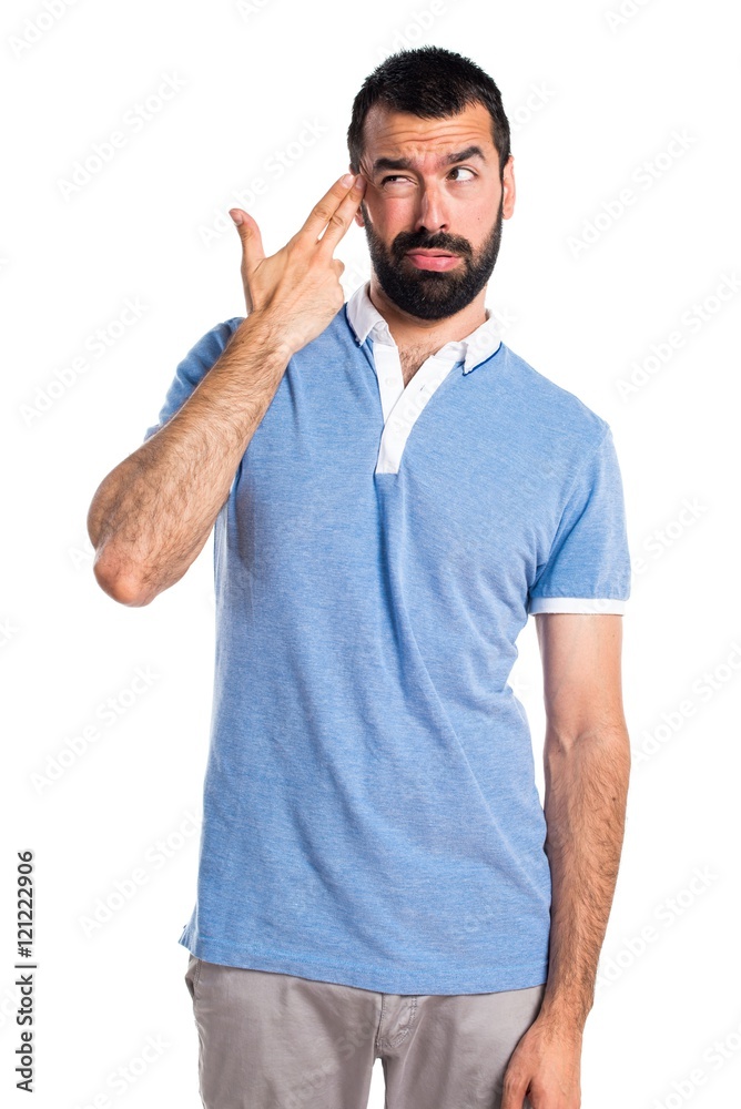 Man with blue shirt making suicide gesture Man with blue shirt making suicide gesture