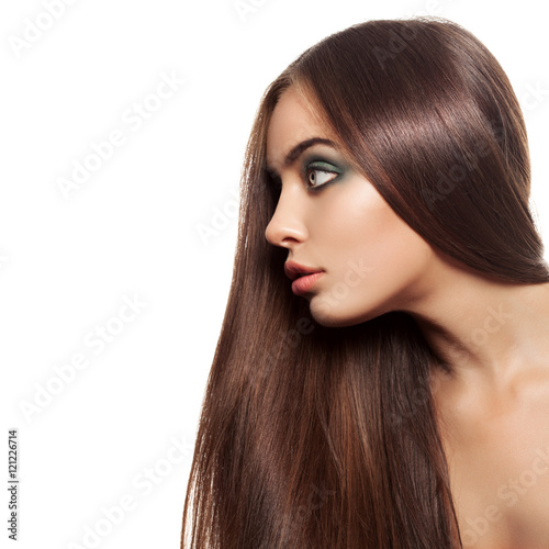 Beauty Woman With Healthy Brown Hair. Long Shiny Straight Hair.