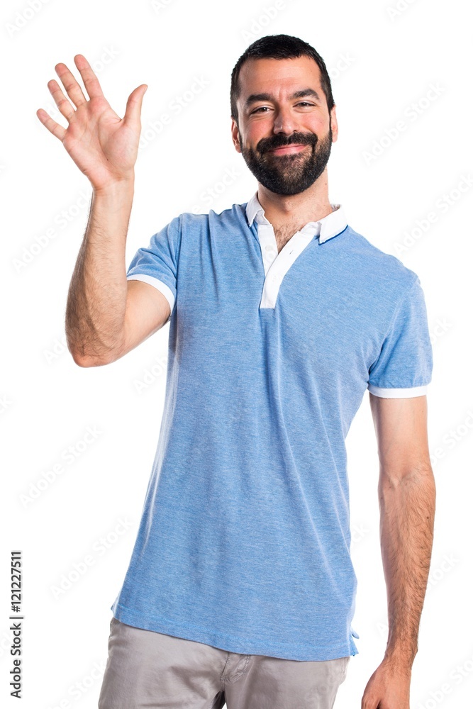 Man with blue shirt saluting Man with blue shirt saluting