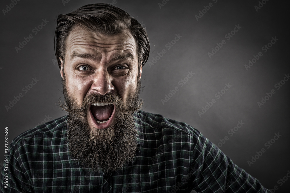 Closeup portrait of a furious man yelling