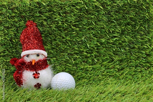 golf ball on green course background idea for Christmas theme