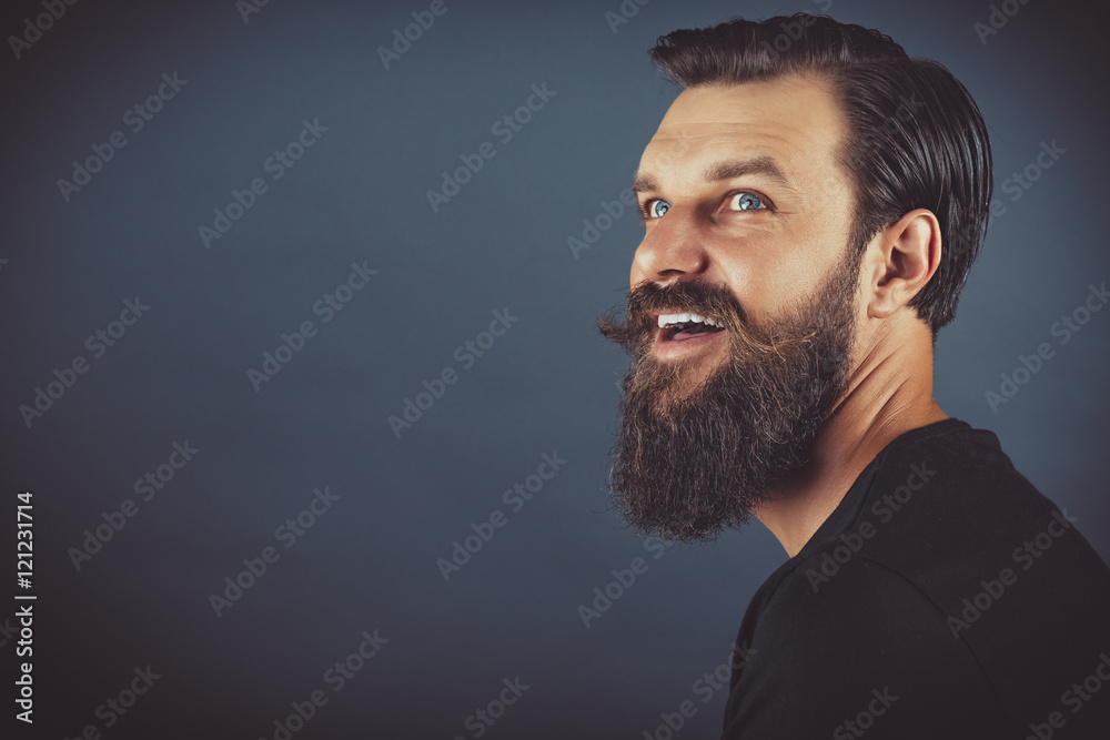 happy stylish man with beard and mustache