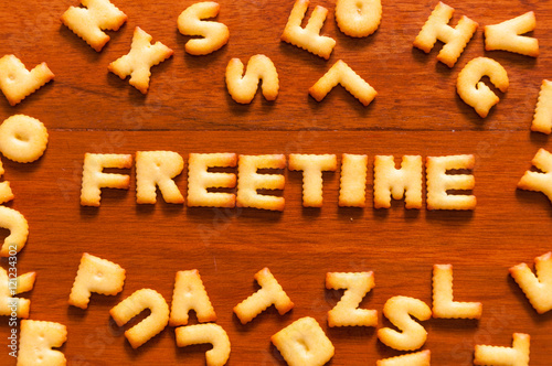 the word freetime written with cracker photo