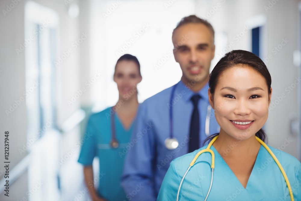 Portrait smiling doctor and nurses