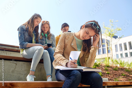 student girl suffering of classmates mockery