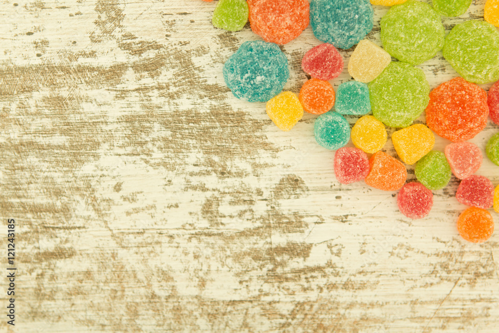Naklejka premium Colorful jelly beans to wallpaper