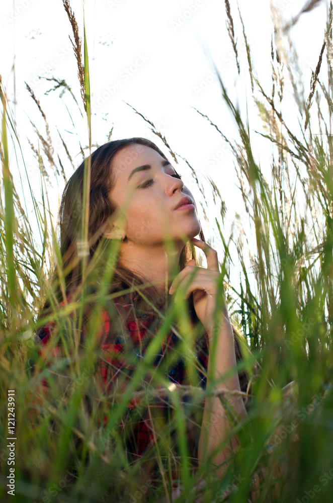 Fototapeta premium girl walking in field