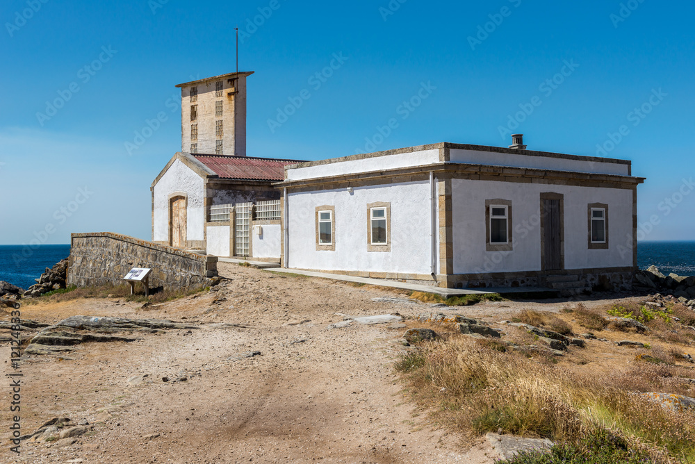 Old residence of the lighthouse keeper in Corrubedo Cape, Galicia (Spain)