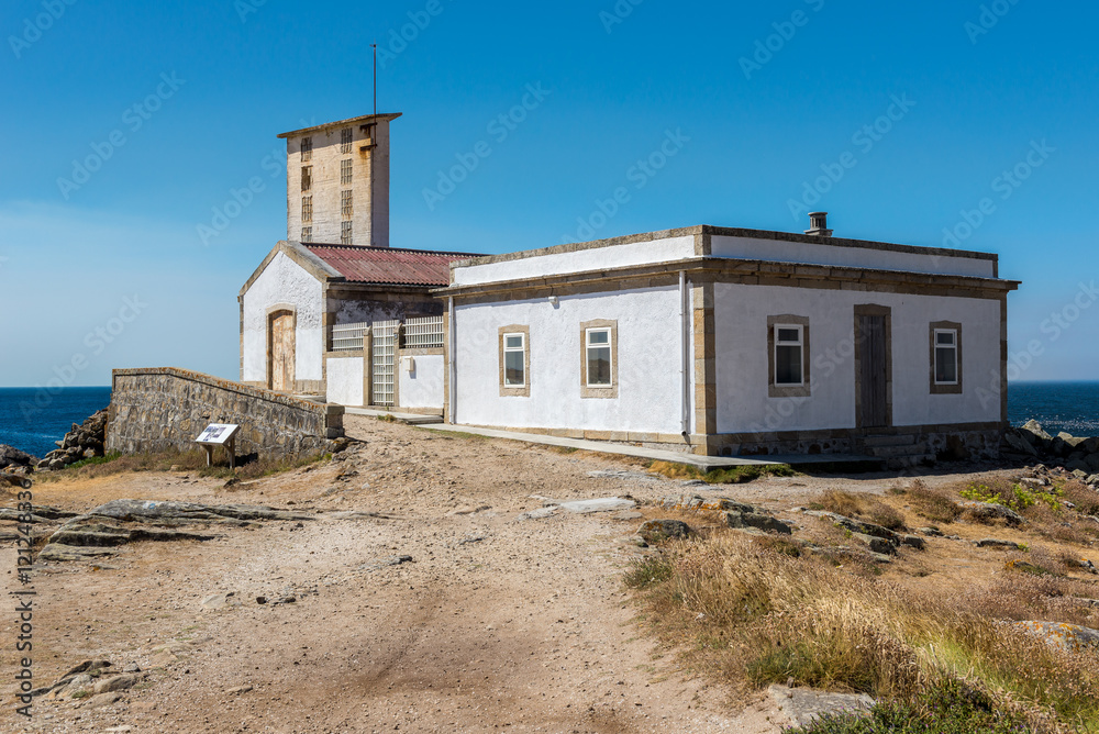 Old residence of the lighthouse keeper in Corrubedo Cape, Galicia (Spain) Old residence of the lighthouse keeper in Corrubedo Cape, Galicia (Spain)