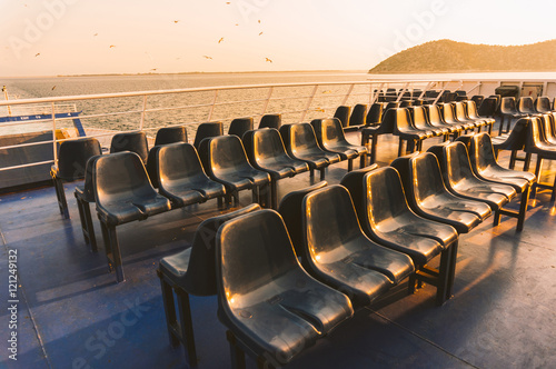 Empty chairs on a ferry