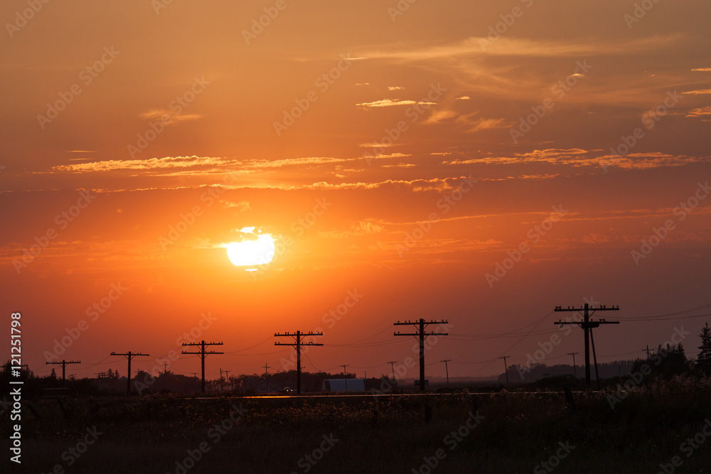Silhouetted Power Lines at Golden Sunset