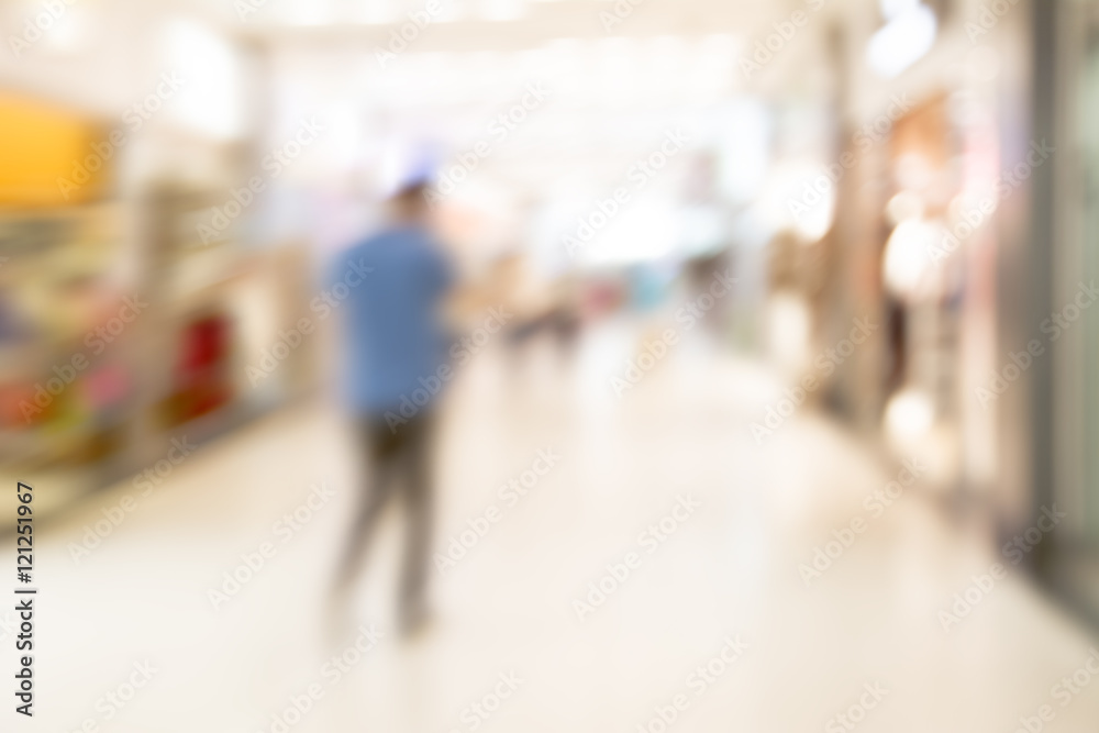 abstract blurred background of people in shop, sale concept