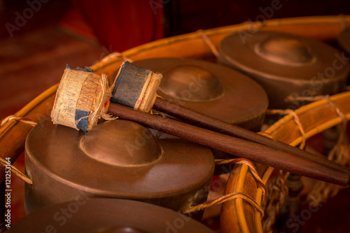 Khong Wong Lek,a percussion instrument consisting of small gongs of different pitches strung together in a semicircle.