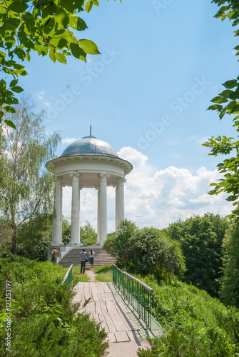 Fototapeta Old pavilion in the summer park