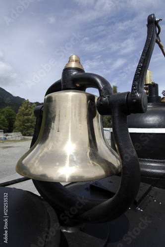 Steam Engine Bell with blue sky