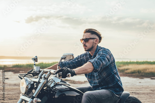 man riding motorcycle