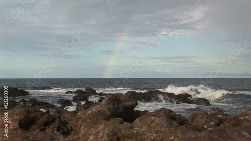 Rainbow from the sea Aruba island in the caribbean photo