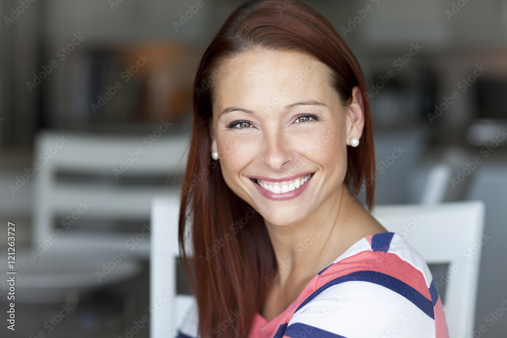 Smiling Woman At Home Looking At The Camera Smiling Woman At Home Looking At The Camera