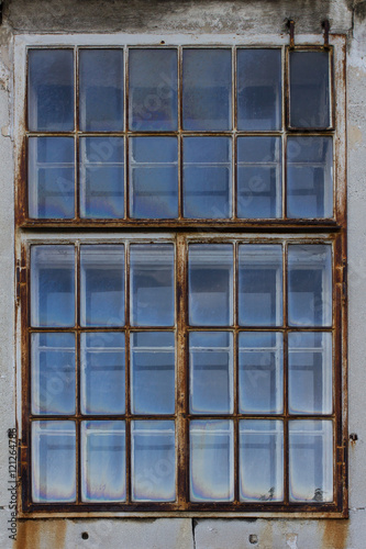 Old window with rusty frame