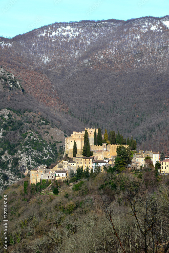 Rocca Sinibalda (Rieti, Italy) with the famous medieval castle, in a winter day, with snowy peaks