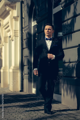 Wallpaper Mural Young man in suit Torontodigital.ca