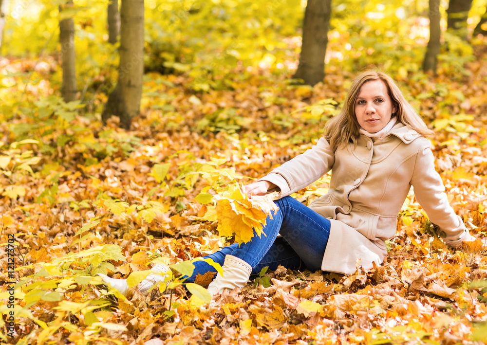 Autumn woman on leafs background Autumn woman on leafs background