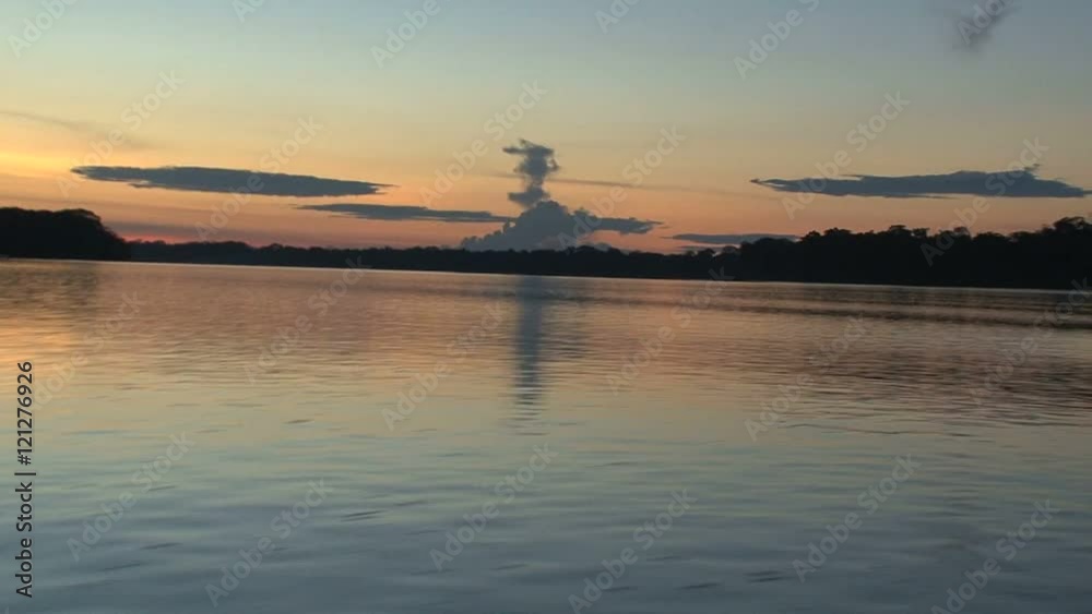 Sunset from boat in the amazone rainforest Sunset from boat in the amazone rainforest