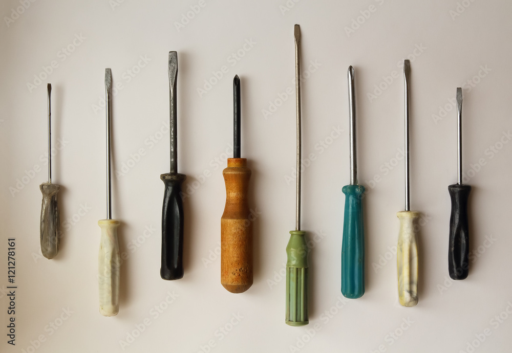 set of old rusty screwdrivers on a white background set of old rusty screwdrivers on a white background