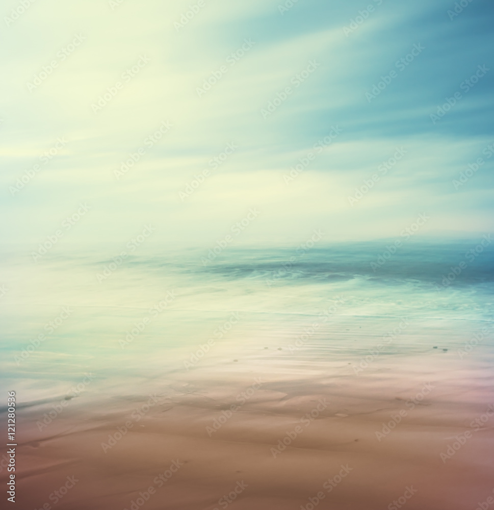 Cross-Processed Sea and Sand. An abstract, time-exposure seascape with panning movement.  Image displays a retro, vintage look with cross-processed colors.