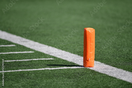 A pylon on a football field.