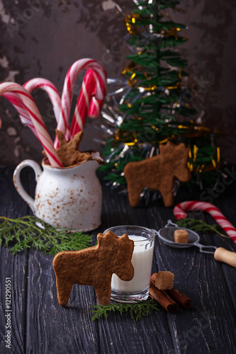 Christmas cookies in shape of deer and milk