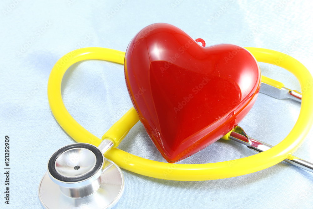 Medical instruments, stethoscope and red heart closeup shot Medical instruments, stethoscope and red heart closeup shot