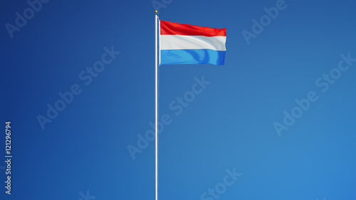 Luxembourg flag waving against clean blue sky, long shot, isolated with clipping path mask alpha channel transparency