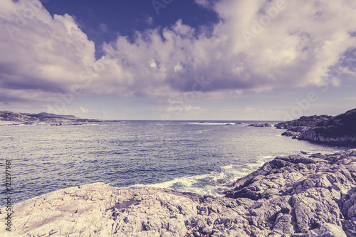 The coast of southern Norway with an ocean view photo